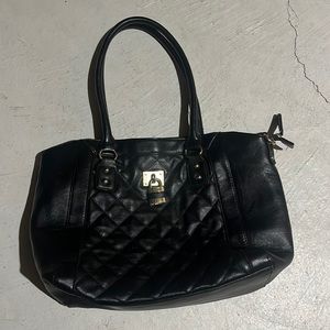 Medium / large black shoulder bag . With zipper and gold lock accessory